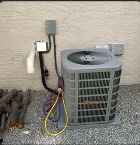 AC condenser install against home siding