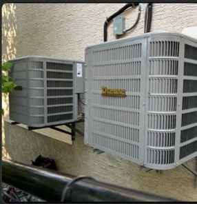 Dual-unit AC condenser install by Sunny Heating and Cooling, Calgary